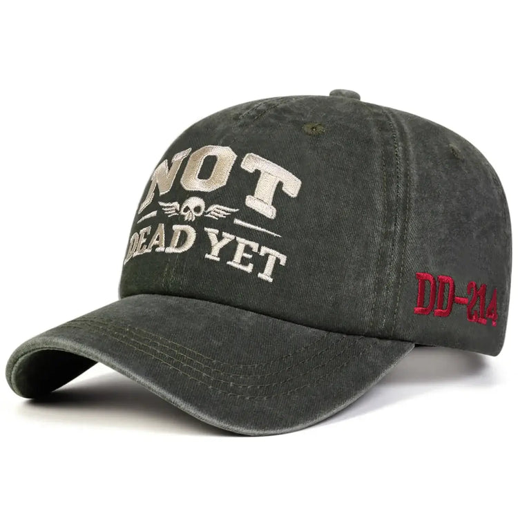 Unisex NOT DEAD YET Embroidery Wash Baseball cap featuring stylish embroidery on dark fabric.